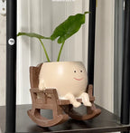 Gyngende blomsterpotte